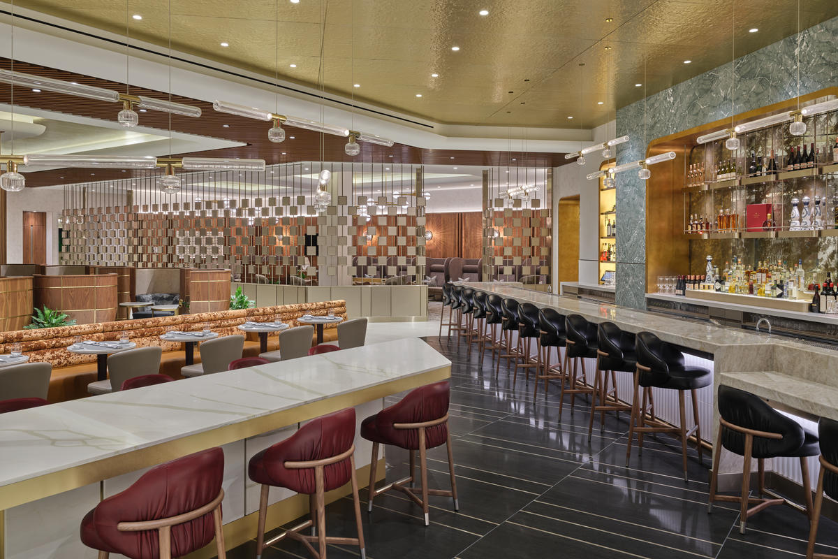 A view of the bar seats at the LAX Delta One Lounge. The entire lounge includes seating for nearly 200 guests.