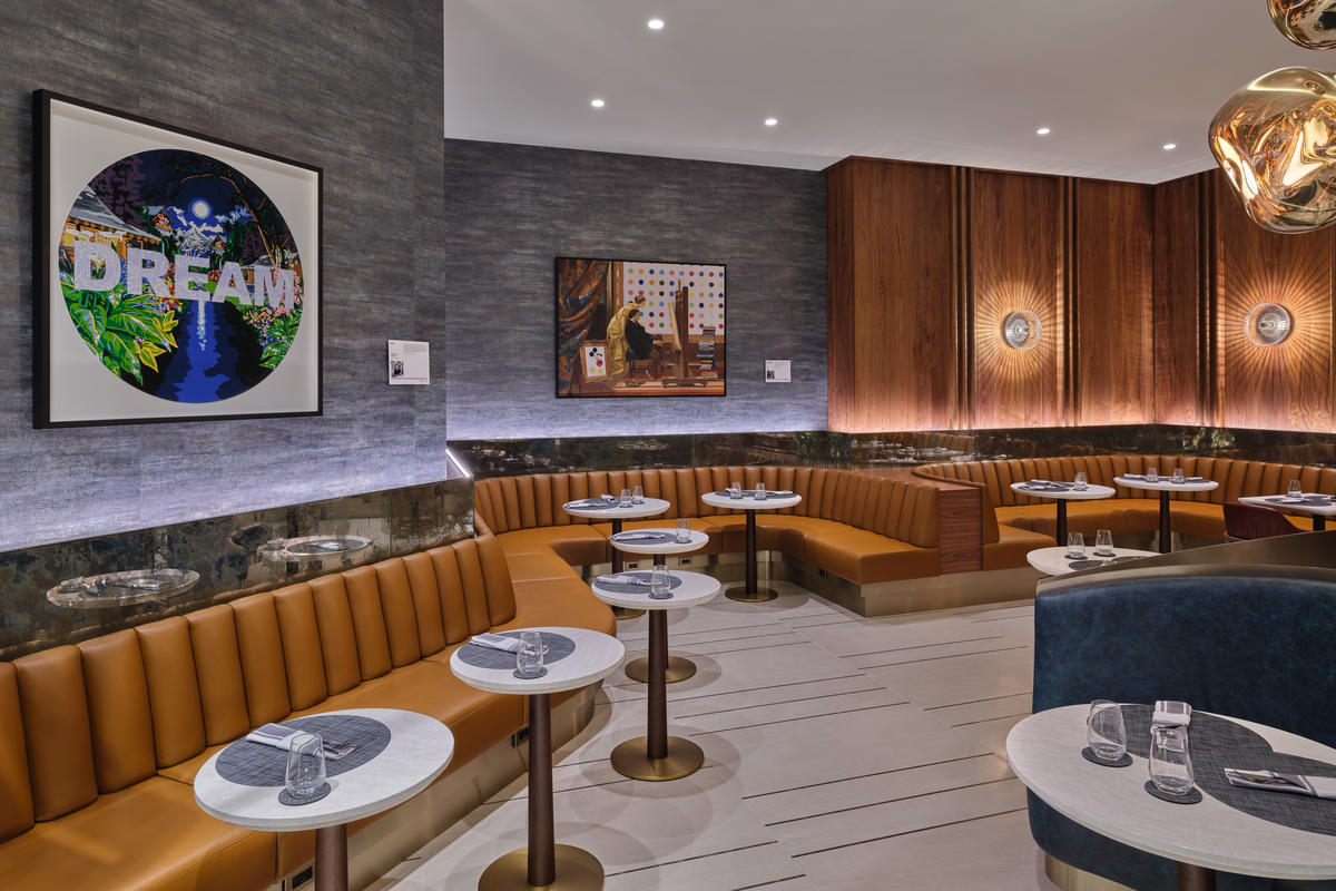 A shot of some seats in the dining room area of the LAX Delta One Lounge