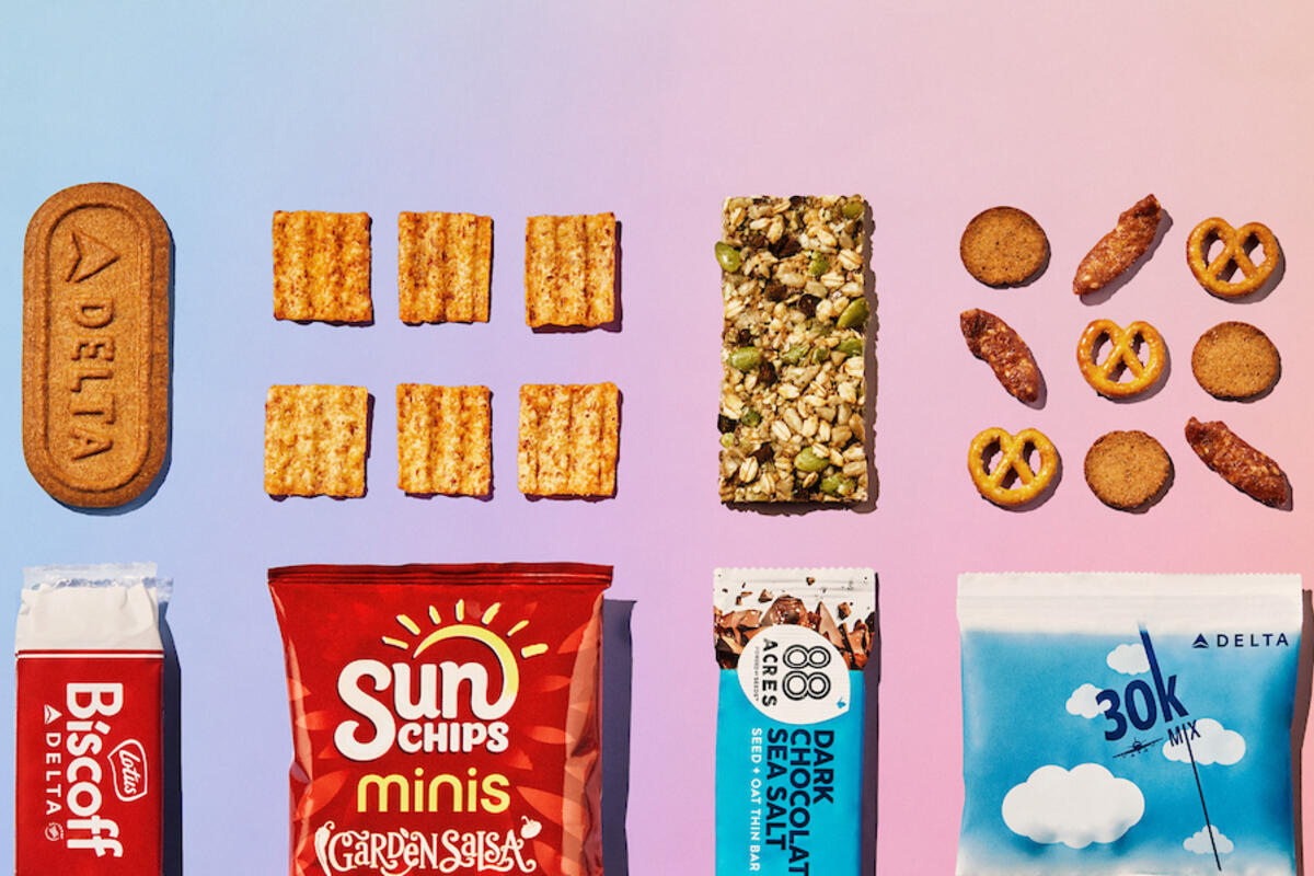 All Delta customers on flights over 499 miles can choose from one of four sweet or savory snacks, including: Lotus Biscoff cookies, 88 Acres dark chocolate sea salt seed and oat bar, 30K snack mix or SunChips Garden Salsa flavored whole grain snacks. 