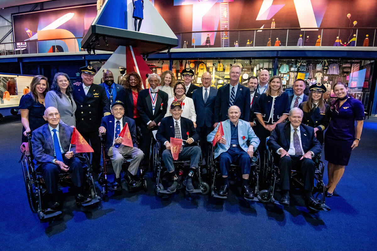 Group shot including six WWII veterans at Virginie Durr's French Legion of Honor ceremony.