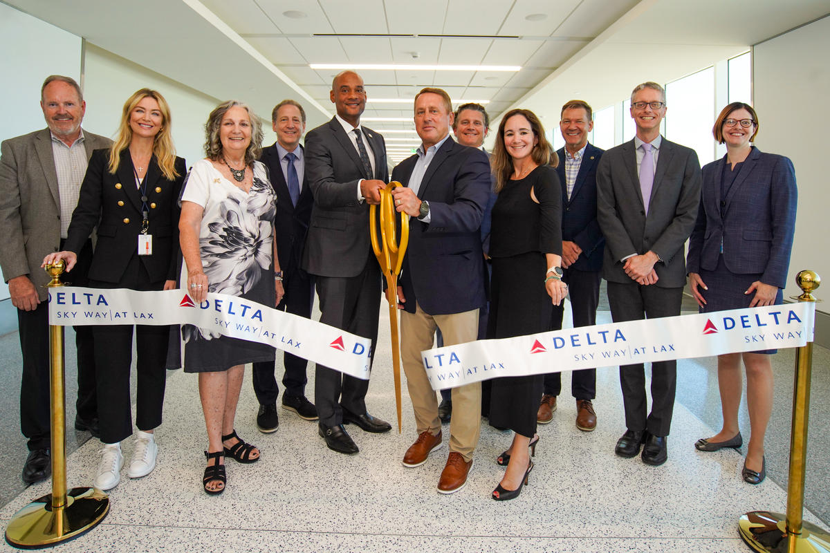 The ribbon cutting for the unveiling of Delta and Los Angeles World Airports' final major phase of the Delta Sky Way at LAX project.