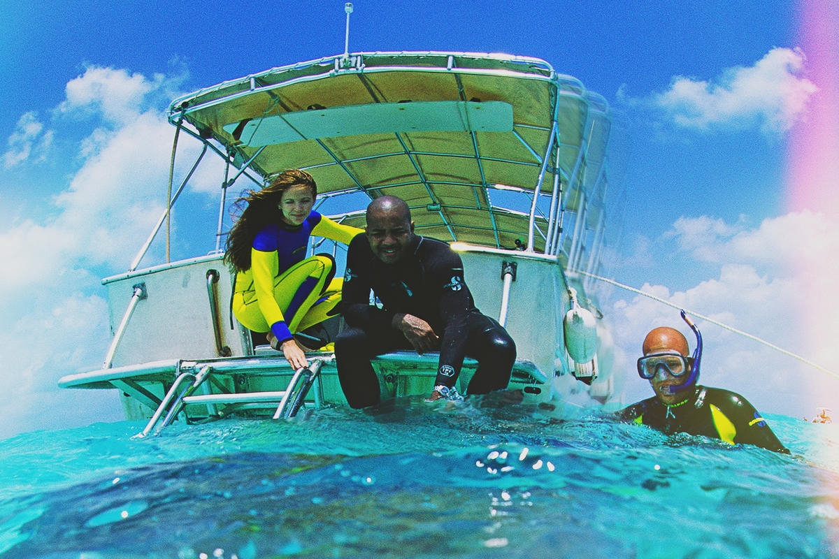 Scuba divers are shown off the coast of Bora-Bora.