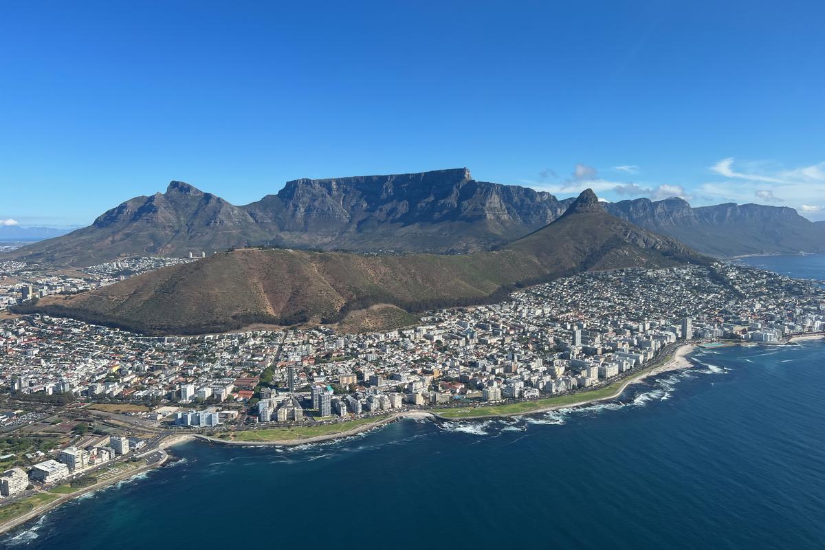 Cape Town, South Africa is located on the country’s southwest coast, bordering the sea beneath the dominant Table Mountain.