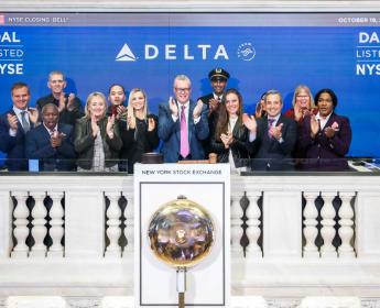 Ed Bastian is joined by Delta employees at the NYSE.