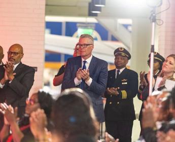 Delta CEO Ed Bastian stands alongside OneTen CEO Maurice Jones at the Delta Flight Musuem, introducing Delta’s formal commitment to OneTen as the Atlanta City Lead.  