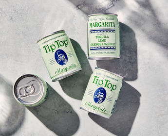 A flatlay of TipTop Margarita cans