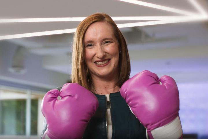 When Kristen Manion Taylor, Senior Vice President of In-Flight Service, announced her breast cancer diagnosis to her “Delta family,” a care package from her “survival sister,” Marenda Hughes Taylor, contained the ultimate memento for the battle ahead: a pair of pink boxing gloves. 